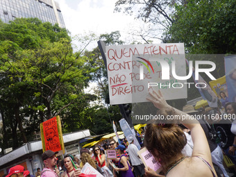 Protestors march for climate justice and against wildfires affecting the entire country in Sao Paulo, Brazil, on September 22, 2024. (