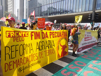 Protestors march for climate justice and against wildfires affecting the entire country in Sao Paulo, Brazil, on September 22, 2024. (