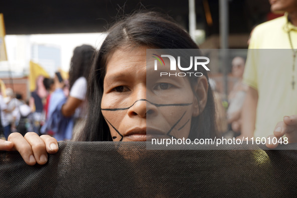 Protestors march for climate justice and against wildfires affecting the entire country in Sao Paulo, Brazil, on September 22, 2024. 