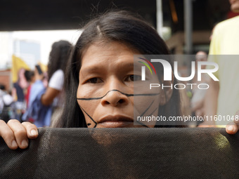 Protestors march for climate justice and against wildfires affecting the entire country in Sao Paulo, Brazil, on September 22, 2024. (