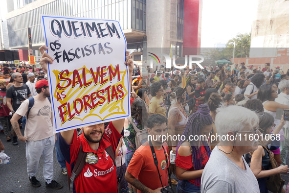 Protestors march for climate justice and against wildfires affecting the entire country in Sao Paulo, Brazil, on September 22, 2024. 