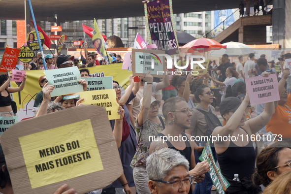 Protestors march for climate justice and against wildfires affecting the entire country in Sao Paulo, Brazil, on September 22, 2024. 