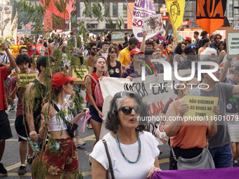 Protestors march for climate justice and against wildfires affecting the entire country in Sao Paulo, Brazil, on September 22, 2024. (