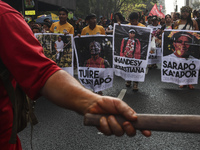 Protesters hold a demonstration against the fires and the climate situation in Brazil and for agrarian reform on Avenida Paulista, in the ce...