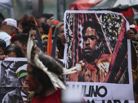 Protesters hold a demonstration against the fires and the climate situation in Brazil and for agrarian reform on Avenida Paulista, in the ce...