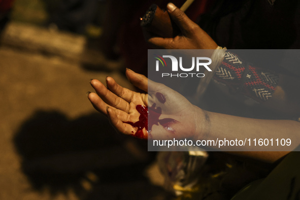 Protesters hold a demonstration against the fires and the climate situation in Brazil and for agrarian reform on Avenida Paulista, in the ce...