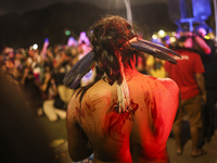 Protesters hold a demonstration against the fires and the climate situation in Brazil and for agrarian reform on Avenida Paulista, in the ce...