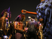 Protesters hold a demonstration against the fires and the climate situation in Brazil and for agrarian reform on Avenida Paulista, in the ce...