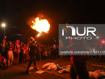 Protesters hold a demonstration against the fires and the climate situation in Brazil and for agrarian reform on Avenida Paulista, in the ce...