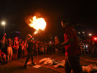 Protesters hold a demonstration against the fires and the climate situation in Brazil and for agrarian reform on Avenida Paulista, in the ce...