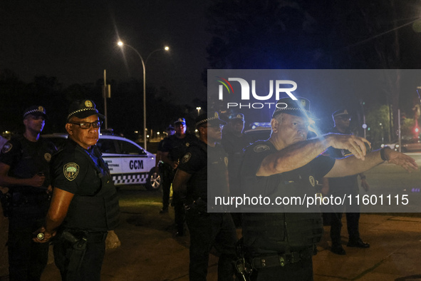 Protesters hold a demonstration against the fires and the climate situation in Brazil and for agrarian reform on Avenida Paulista, in the ce...