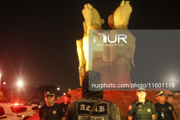 Protesters hold a demonstration against the fires and the climate situation in Brazil and for agrarian reform on Avenida Paulista, in the ce...