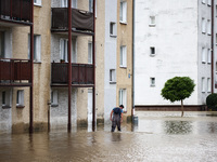 A man walks in the water after Nysa Klodzka river flooded town of Lewin Brzeski in southwestern Poland, on September 19th, 2024. Storm Boris...