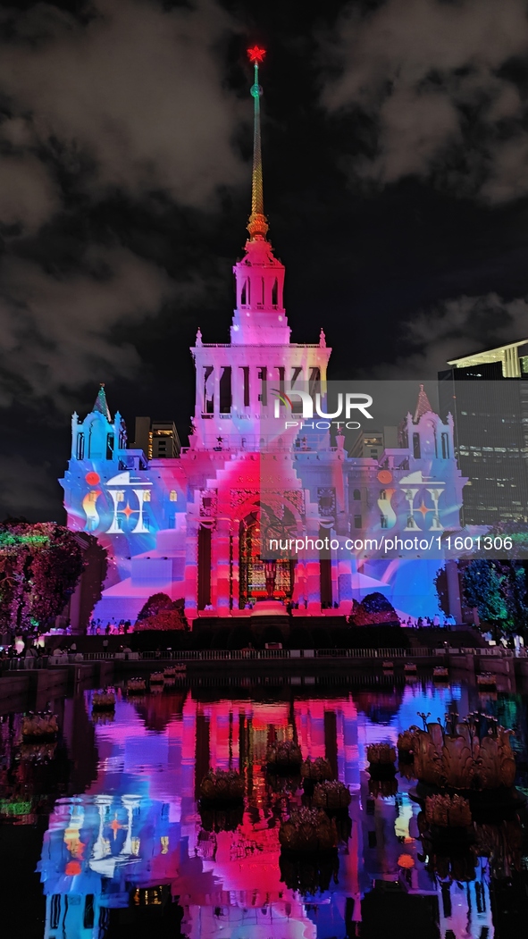 Visitors visit a historic landmark and classic Russian design exhibition center transformed into a ''Disneyland castle'' to celebrate China'...