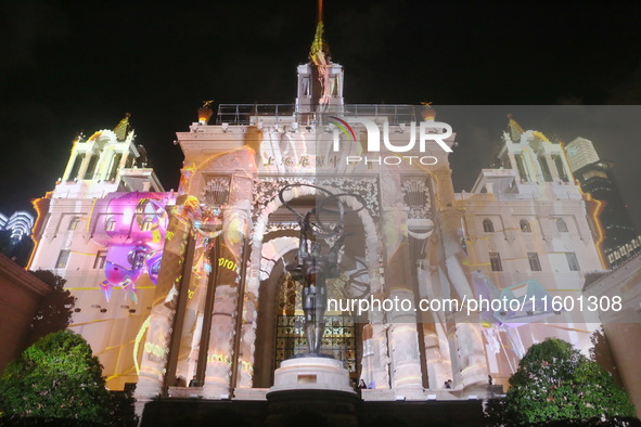 Visitors visit a historic landmark and classic Russian design exhibition center transformed into a ''Disneyland castle'' to celebrate China'...