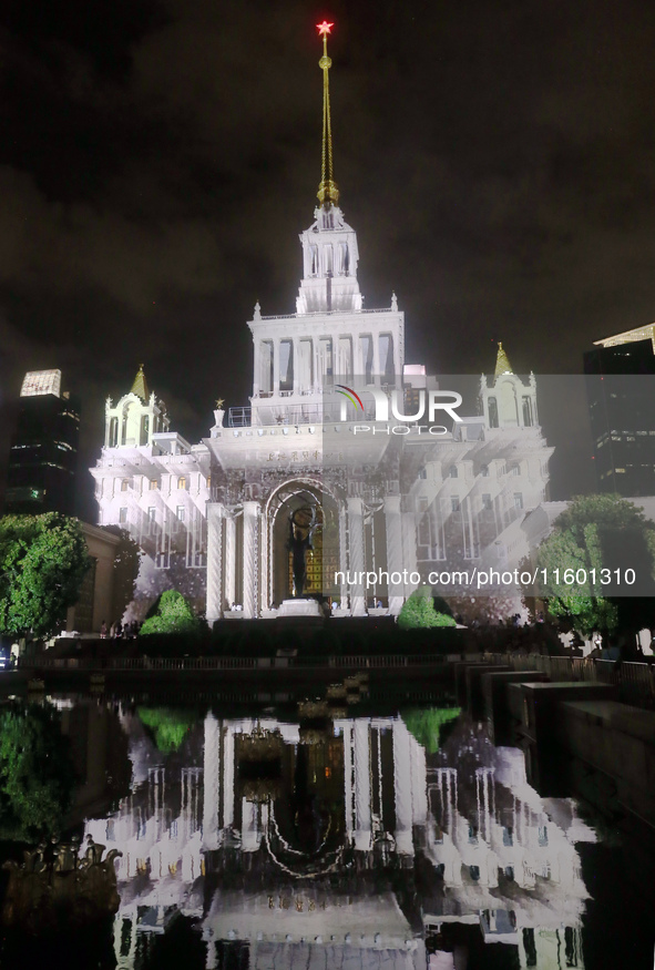 Visitors visit a historic landmark and classic Russian design exhibition center transformed into a ''Disneyland castle'' to celebrate China'...