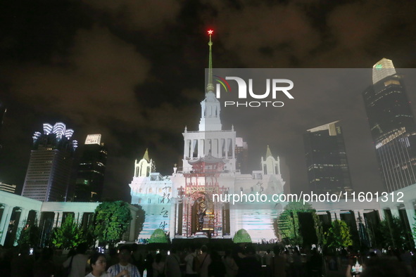 Visitors visit a historic landmark and classic Russian design exhibition center transformed into a ''Disneyland castle'' to celebrate China'...