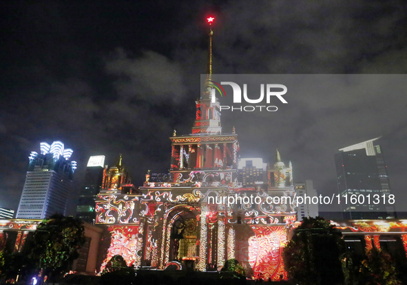 Visitors visit a historic landmark and classic Russian design exhibition center transformed into a ''Disneyland castle'' to celebrate China'...