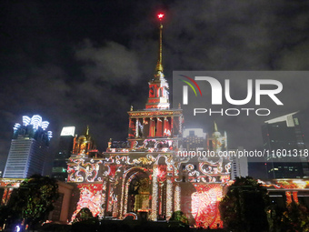 Visitors visit a historic landmark and classic Russian design exhibition center transformed into a ''Disneyland castle'' to celebrate China'...