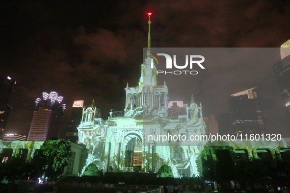 Visitors visit a historic landmark and classic Russian design exhibition center transformed into a ''Disneyland castle'' to celebrate China'...