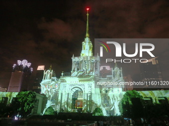 Visitors visit a historic landmark and classic Russian design exhibition center transformed into a ''Disneyland castle'' to celebrate China'...