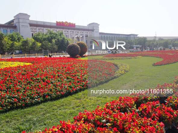 The flower altar at Tian 'anmen Square celebrates the upcoming National Day in Beijing, China, on September 23, 2024. 