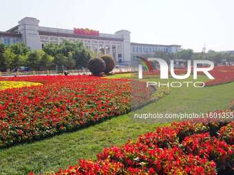 The flower altar at Tian 'anmen Square celebrates the upcoming National Day in Beijing, China, on September 23, 2024. (