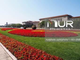 The flower altar at Tian 'anmen Square celebrates the upcoming National Day in Beijing, China, on September 23, 2024. (