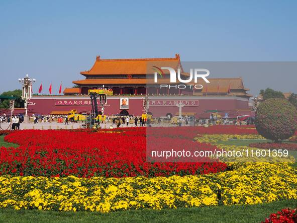 The flower altar at Tian 'anmen Square celebrates the upcoming National Day in Beijing, China, on September 23, 2024. 