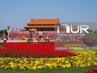 The flower altar at Tian 'anmen Square celebrates the upcoming National Day in Beijing, China, on September 23, 2024. (