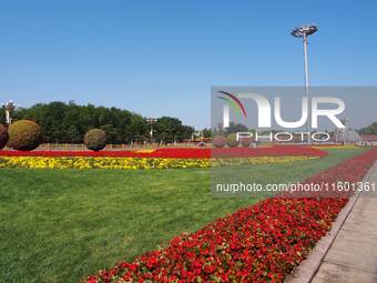 The flower altar at Tian 'anmen Square celebrates the upcoming National Day in Beijing, China, on September 23, 2024. (