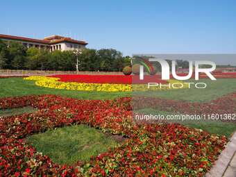 The flower altar at Tian 'anmen Square celebrates the upcoming National Day in Beijing, China, on September 23, 2024. (