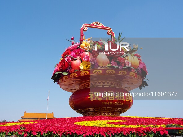 Flower baskets are seen at Tian'anmen Square to celebrate the upcoming National Day in Beijing, China, on September 23, 2024. 