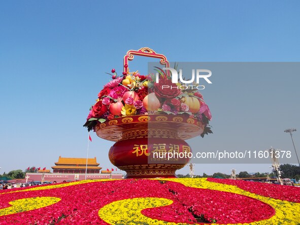 Flower baskets are seen at Tian'anmen Square to celebrate the upcoming National Day in Beijing, China, on September 23, 2024. 