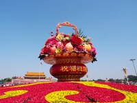 Flower baskets are seen at Tian'anmen Square to celebrate the upcoming National Day in Beijing, China, on September 23, 2024. (