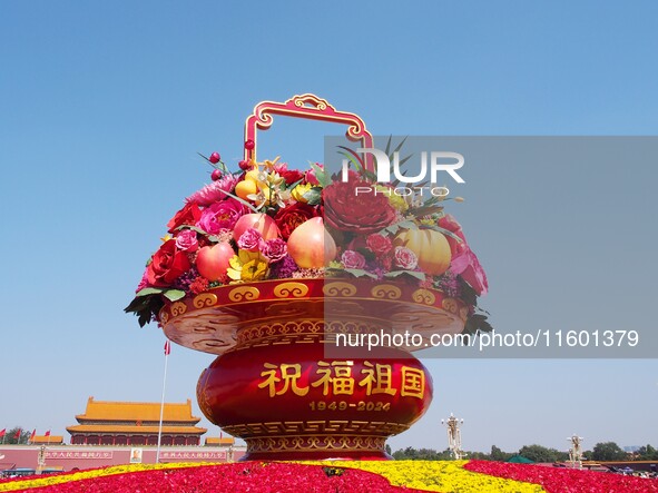 Flower baskets are seen at Tian'anmen Square to celebrate the upcoming National Day in Beijing, China, on September 23, 2024. 