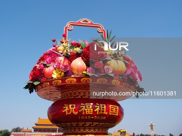 Flower baskets are seen at Tian'anmen Square to celebrate the upcoming National Day in Beijing, China, on September 23, 2024. 