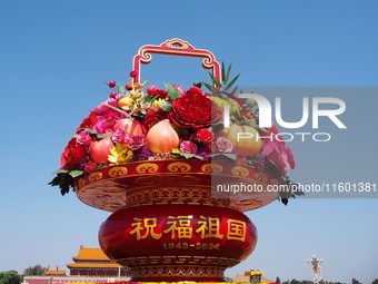 Flower baskets are seen at Tian'anmen Square to celebrate the upcoming National Day in Beijing, China, on September 23, 2024. (