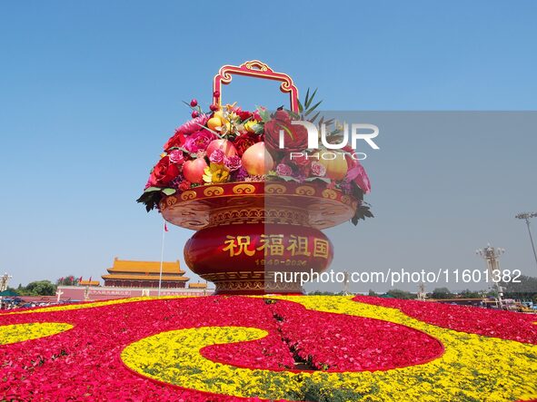 Flower baskets are seen at Tian'anmen Square to celebrate the upcoming National Day in Beijing, China, on September 23, 2024. 