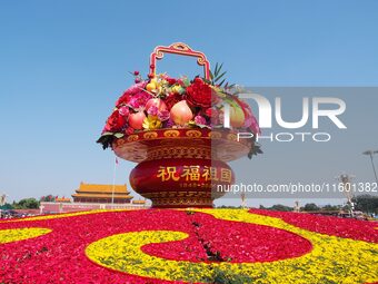 Flower baskets are seen at Tian'anmen Square to celebrate the upcoming National Day in Beijing, China, on September 23, 2024. (