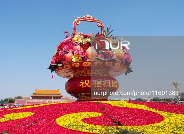 Flower baskets are seen at Tian'anmen Square to celebrate the upcoming National Day in Beijing, China, on September 23, 2024. 