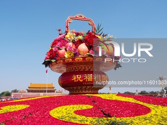 Flower baskets are seen at Tian'anmen Square to celebrate the upcoming National Day in Beijing, China, on September 23, 2024. (