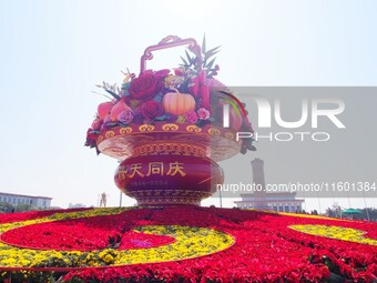 Flower baskets are seen at Tian'anmen Square to celebrate the upcoming National Day in Beijing, China, on September 23, 2024. (