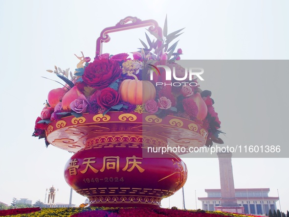 Flower baskets are seen at Tian'anmen Square to celebrate the upcoming National Day in Beijing, China, on September 23, 2024. 