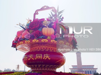 Flower baskets are seen at Tian'anmen Square to celebrate the upcoming National Day in Beijing, China, on September 23, 2024. (