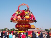 Flower baskets are seen at Tian'anmen Square to celebrate the upcoming National Day in Beijing, China, on September 23, 2024. (