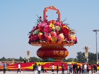 Flower baskets are seen at Tian'anmen Square to celebrate the upcoming National Day in Beijing, China, on September 23, 2024. (