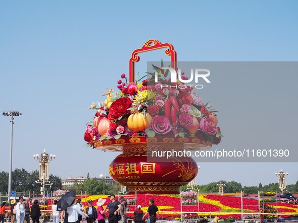 Flower baskets are seen at Tian'anmen Square to celebrate the upcoming National Day in Beijing, China, on September 23, 2024. 