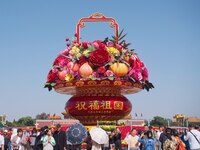 Flower baskets are seen at Tian'anmen Square to celebrate the upcoming National Day in Beijing, China, on September 23, 2024. (