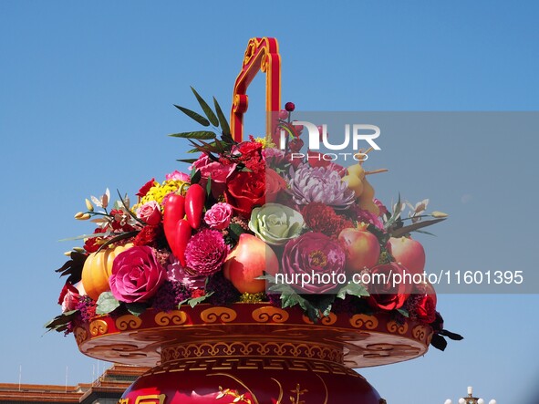 Flower baskets are seen at Tian'anmen Square to celebrate the upcoming National Day in Beijing, China, on September 23, 2024. 